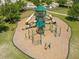 Aerial view of community playground featuring slides, climbing structures, and swings at 19487 Roseate Dr, Lutz, FL 33558