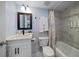 Bathroom featuring a single vanity, white cabinets, and a shower and tub combination at 19727 Gulf Blvd # 210, Indian Shores, FL 33785