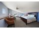Spacious bedroom with multiple beds, a ceiling fan, natural light and comfortable furnishings at 19727 Gulf Blvd # 210, Indian Shores, FL 33785
