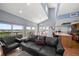 Bright and spacious living room with vaulted ceilings, opening up to the kitchen and scenic views at 19727 Gulf Blvd # 210, Indian Shores, FL 33785