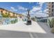Modern metal art sculpture is featured in a community green space with murals and landscaping features at 199 Dali Blvd # 902, St Petersburg, FL 33701