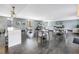 Spacious community room with modern decor, dining tables, and a lounge area, fostering resident interactions and gatherings at 199 Dali Blvd # 902, St Petersburg, FL 33701