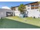 Dog park area features a wash station on a well-maintained artificial lawn at 199 Dali Blvd # 902, St Petersburg, FL 33701