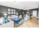 Inviting living room with modern furnishings, stylish decor, and an open layout connecting to the dining area at 199 Dali Blvd # 902, St Petersburg, FL 33701