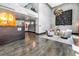 Modern lobby featuring art installations, comfortable seating, and sleek tile flooring at 199 Dali Blvd # 902, St Petersburg, FL 33701