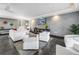 Well-designed lounge area with comfortable seating, decorative elements, and a modern entertainment setup at 199 Dali Blvd # 902, St Petersburg, FL 33701