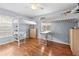 Spacious bedroom featuring modern loft beds with desk and contemporary fixtures at 212 N Bradford Ave, Tampa, FL 33609