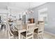 Cozy dining area featuring a rustic wooden table, chandelier lighting, and stylish seating at 212 N Bradford Ave, Tampa, FL 33609