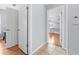 Hallway view showcasing the door leading to a bedroom with a loft bed at 212 N Bradford Ave, Tampa, FL 33609