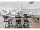 Bright kitchen boasts a large center island with barstool seating and stainless steel appliances at 212 N Bradford Ave, Tampa, FL 33609