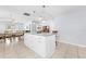 Open concept kitchen with island features seating and stainless steel appliances at 212 N Bradford Ave, Tampa, FL 33609