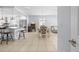 Open living space featuring a modern kitchen, dining area, and stylish furniture at 212 N Bradford Ave, Tampa, FL 33609
