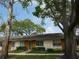 Charming single-story home with mature trees and well-maintained landscaping at 2297 Lark E Cir # E, Palm Harbor, FL 34684