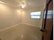 Cozy bedroom featuring natural light and ample space at 2904 W Marlin Ave, Tampa, FL 33611