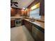 Well-equipped kitchen featuring stainless steel appliances and granite countertops at 2904 W Marlin Ave, Tampa, FL 33611