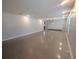 Spacious living room with neutral walls and a large dining area at 2904 W Marlin Ave, Tampa, FL 33611