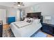 Comfortable bedroom with hardwood floors, neutral walls, and windows, offering a relaxing retreat at 3005 W Helen Ave, Tampa, FL 33611