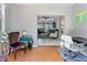 Inviting living area with terracotta floors, neutral walls, and stylish decor, perfect for relaxing or entertaining at 3005 W Helen Ave, Tampa, FL 33611