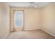 Bedroom featuring neutral walls, ceiling fan, and light filled window at 3023 Bent Creek Dr, Valrico, FL 33596
