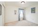 Bright bedroom featuring a closet, neutral carpeting and lots of natural light at 3023 Bent Creek Dr, Valrico, FL 33596