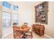 Cozy dining room with wooden table, chairs, and stylish decor at 3023 Bent Creek Dr, Valrico, FL 33596