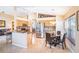 Bright kitchen featuring stainless steel appliances, tile flooring, granite countertops, and breakfast nook at 3023 Bent Creek Dr, Valrico, FL 33596