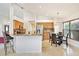Open concept kitchen with granite countertops, stainless steel appliances, and a cozy breakfast nook at 3023 Bent Creek Dr, Valrico, FL 33596