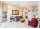 Bright living room featuring travertine floors with easy access to the dining area at 3023 Bent Creek Dr, Valrico, FL 33596
