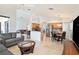 Open concept living room with a bright kitchen, dining area, and comfortable seating at 3023 Bent Creek Dr, Valrico, FL 33596