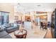 Spacious open-concept living space with kitchen featuring stainless steel appliances at 3023 Bent Creek Dr, Valrico, FL 33596