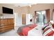 Spacious main bedroom with en-suite access and neutral tones, offering a private retreat at 3023 Bent Creek Dr, Valrico, FL 33596