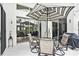 Covered patio with furniture, perfect for outdoor dining and entertaining at 3023 Bent Creek Dr, Valrico, FL 33596
