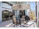 Screened patio with outdoor dining set and grill, perfect for entertaining at 3023 Bent Creek Dr, Valrico, FL 33596
