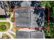 Aerial view of the dark asphalt shingles that make up the roof of this home at 3078 Pointer Dr, Palm Harbor, FL 34683