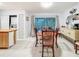 Inviting dining area with sliding glass doors offering natural light and access to the outdoors at 3078 Pointer Dr, Palm Harbor, FL 34683