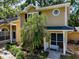 Charming two-story home with landscaped front yard and inviting entryway at 3078 Pointer Dr, Palm Harbor, FL 34683