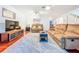 Spacious living room with modern furnishings and access to the dining area at 3078 Pointer Dr, Palm Harbor, FL 34683