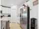 Modern kitchen featuring stainless steel appliances and ample white cabinets at 35029 Brackett Bnd, Zephyrhills, FL 33541