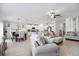 Open living space featuring modern tile floors that connect to the kitchen at 35029 Brackett Bnd, Zephyrhills, FL 33541