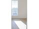 Bright bedroom featuring hardwood floors, a large window and natural light at 3820 Pompano Se Dr, St Petersburg, FL 33705