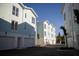 Exterior of modern townhomes and garages at 3820 Pompano Se Dr, St Petersburg, FL 33705