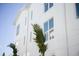 Bright exterior view of newly built townhomes with large windows at 3820 Pompano Se Dr, St Petersburg, FL 33705