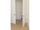 Bright laundry room entryway featuring a tiled floor and modern, white interior at 3820 Pompano Se Dr, St Petersburg, FL 33705