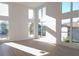 Bright and airy living room with lots of natural light and neutral-toned flooring at 3820 Pompano Se Dr, St Petersburg, FL 33705