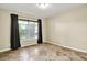 Bedroom featuring black out curtains that allows for lots of natural light at 4101 Hollowtrail Dr, Tampa, FL 33624