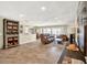 Bright and airy living room combines comfort and style, perfect for gatherings and relaxation with access to outdoor space at 4101 Hollowtrail Dr, Tampa, FL 33624