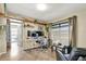 Functional office space with a large window, a work desk, and wood accents at 4101 Hollowtrail Dr, Tampa, FL 33624