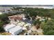 Aerial view showing the neighborhood, nearby airport, and surrounding trees at 4106 N Thatcher, Tampa, FL 33614