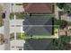 Aerial view showing the roof and backyard; the home is outlined in white to show property lines at 4106 N Thatcher, Tampa, FL 33614