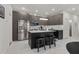 Modern kitchen featuring stainless steel appliances, a large island, and stylish cabinetry at 4106 N Thatcher, Tampa, FL 33614